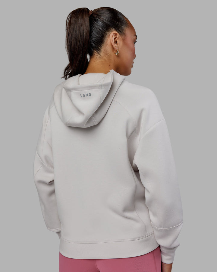 Woman wearing Elevate SoftTouch Zip Through Hoodie - Clay-Clay
