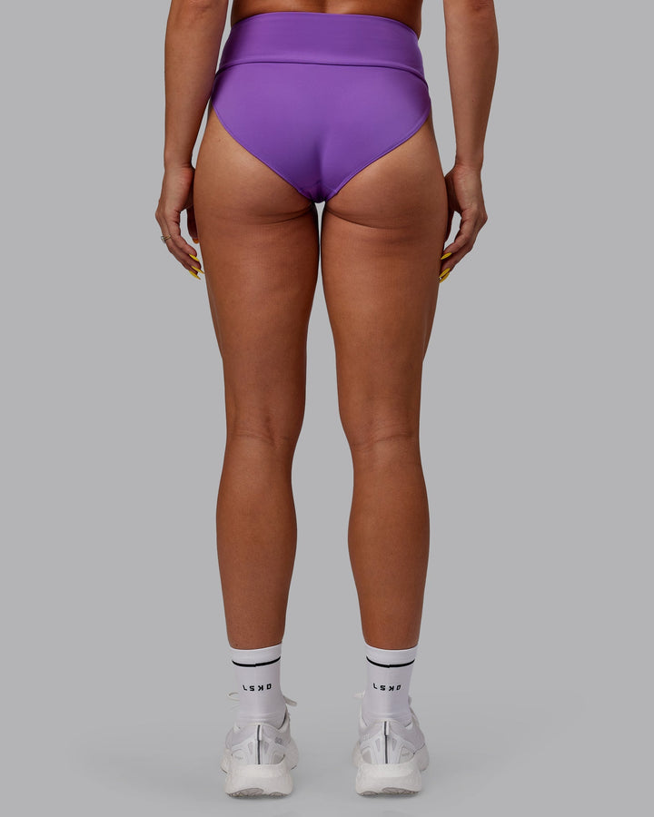 Woman wearing Elevate Sprinting Briefs - Purple Swirl
