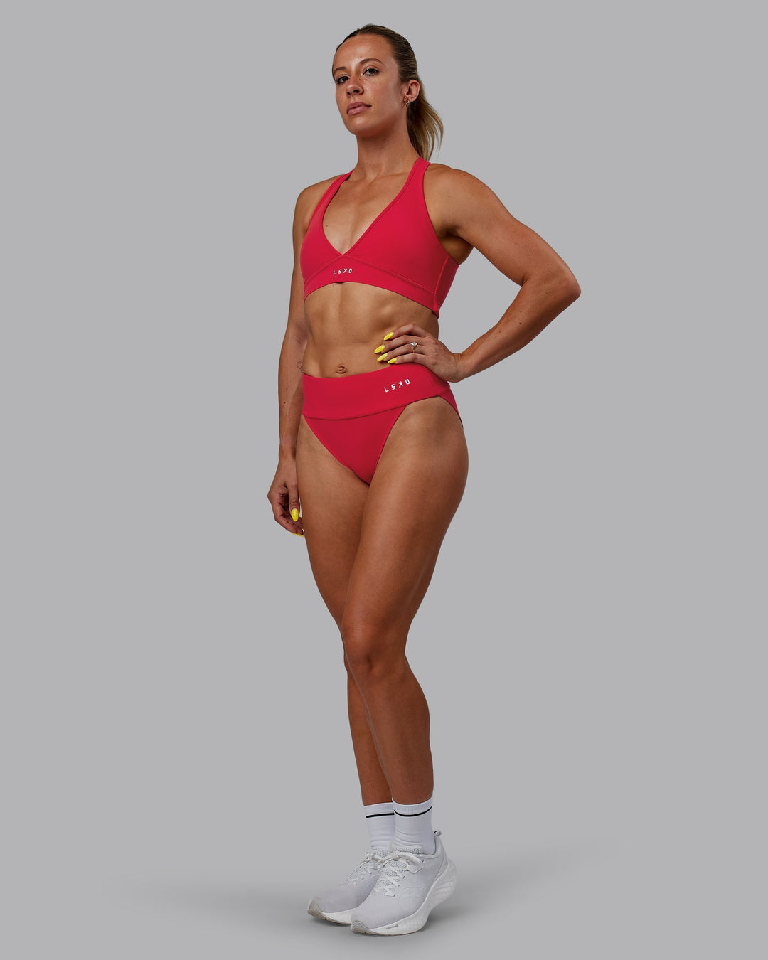 Woman wearing Elevate Sprinting Briefs - Scarlet