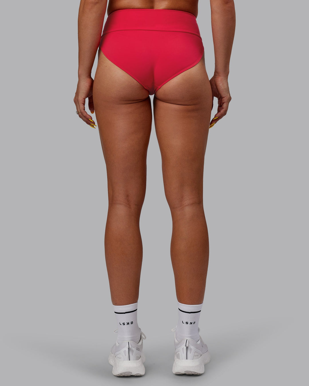 Woman wearing Elevate Sprinting Briefs - Scarlet