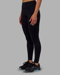 Woman wearing Elite High-Rise Full Length Legging Pockets - Black