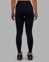 Woman wearing Elite High-Rise Full Length Legging Pockets - Black