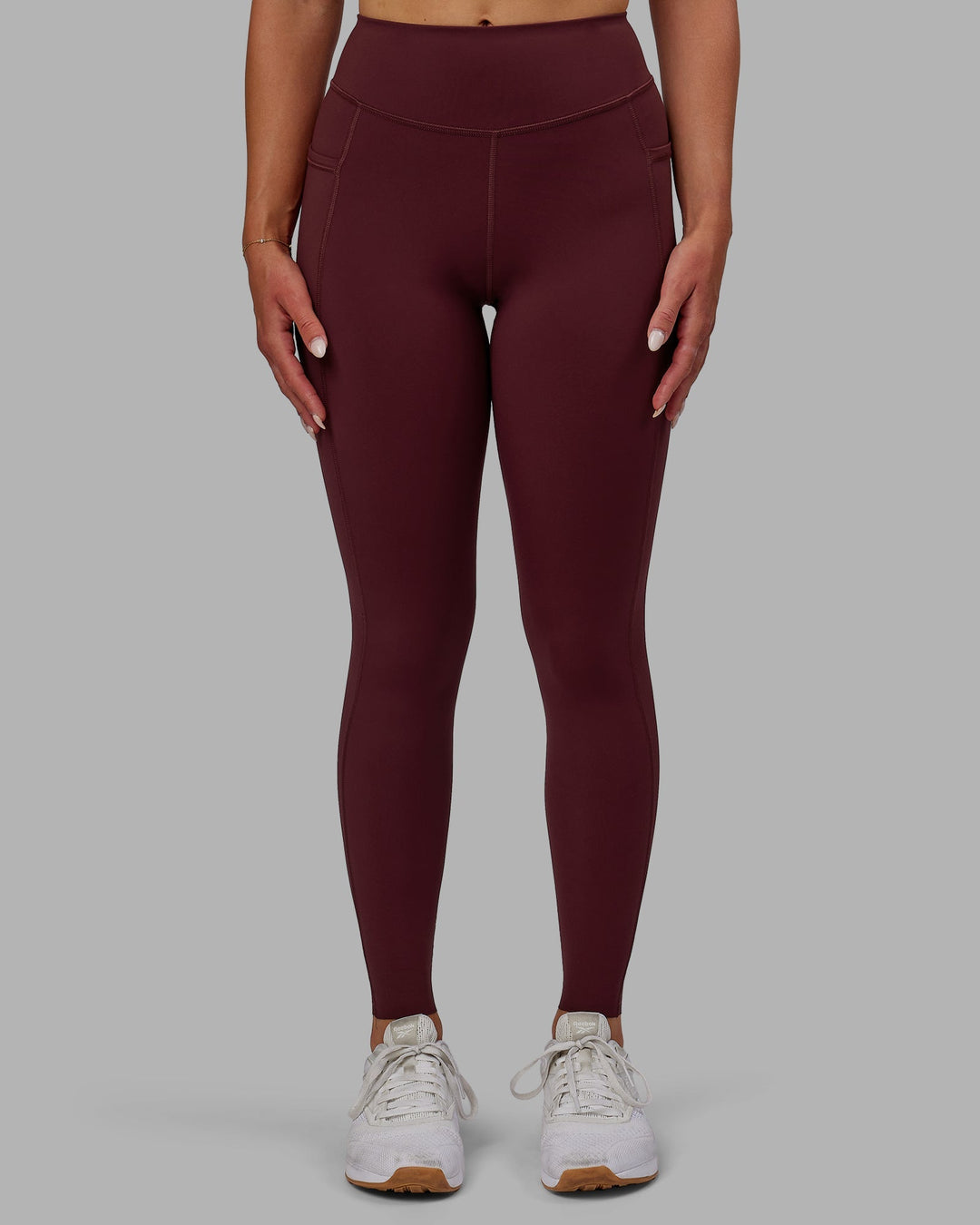 Woman wearing Elite Full Length Leggings - Dark Cherry