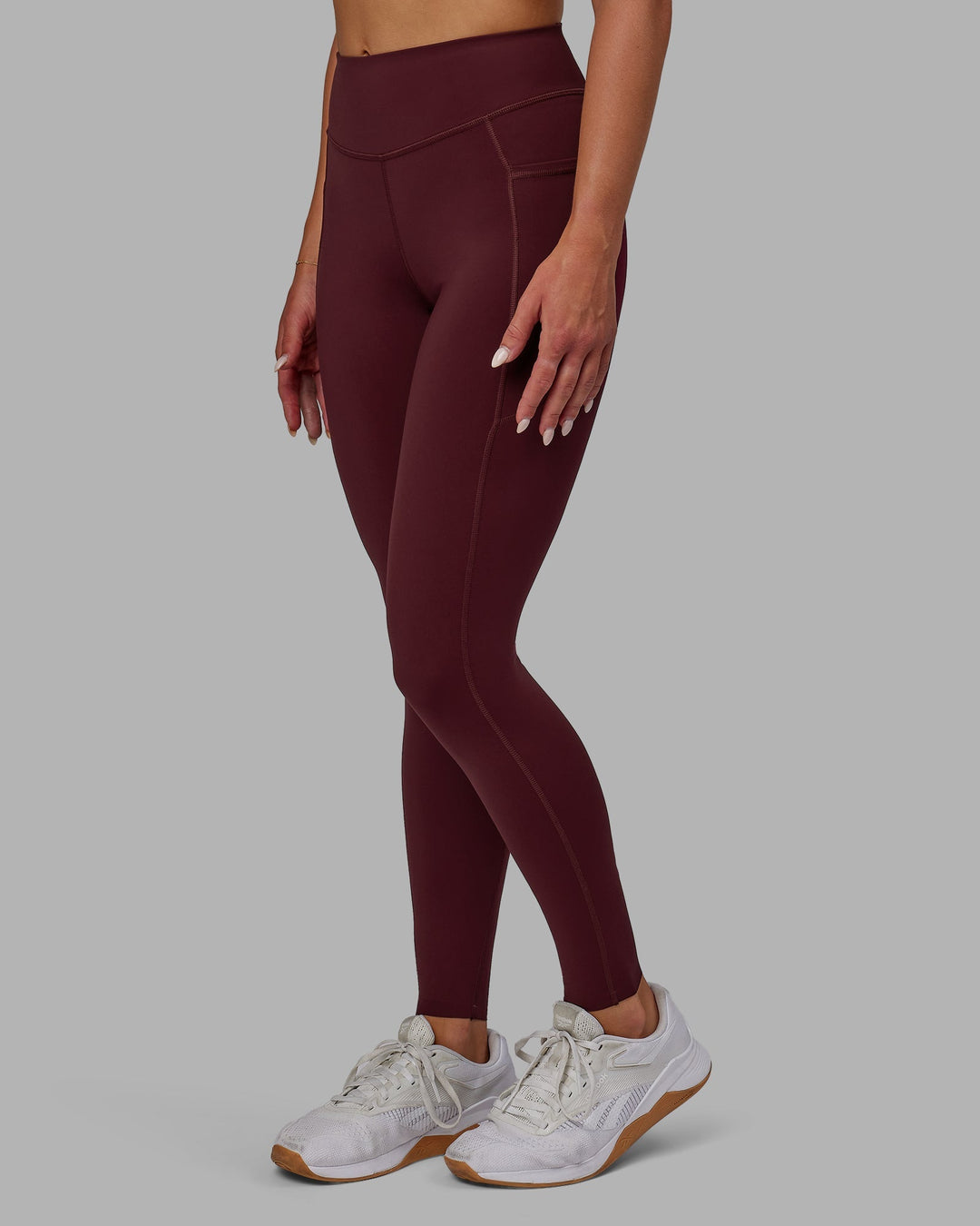 Woman wearing Elite Full Length Leggings - Dark Cherry