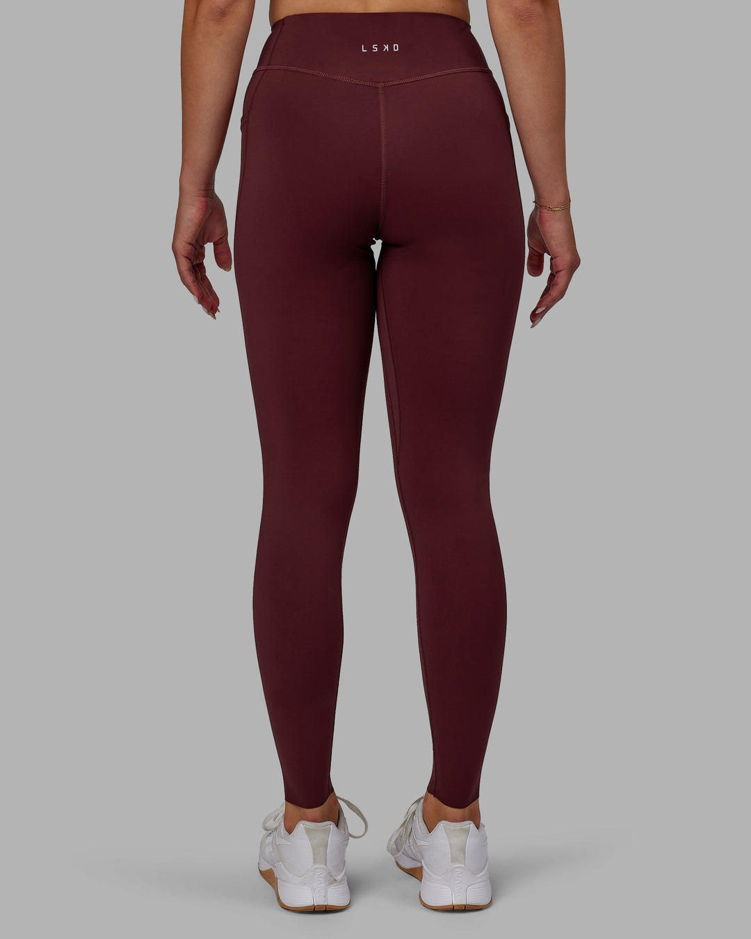 Woman wearing Elite Full Length Leggings - Dark Cherry