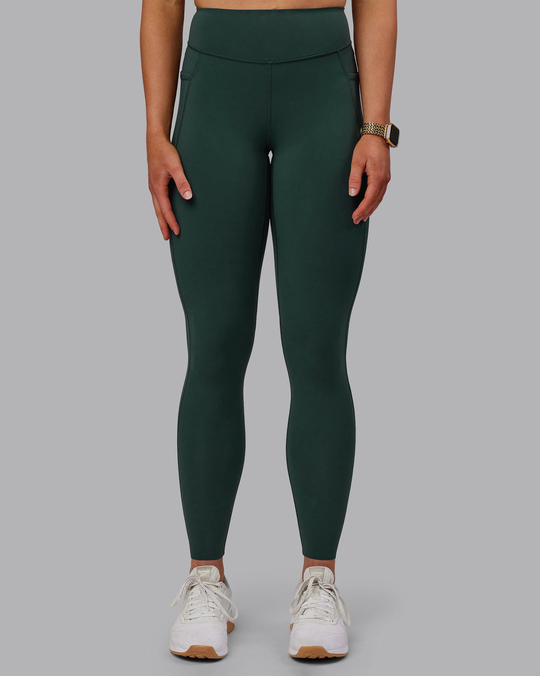 Woman wearing Elite Full Length Leggings - Vital Green