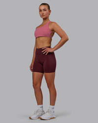Woman wearing Elite High-Rise 6" Short Pockets - Dark Cherry