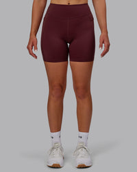 Woman wearing Elite High-Rise 6" Short Pockets - Dark Cherry