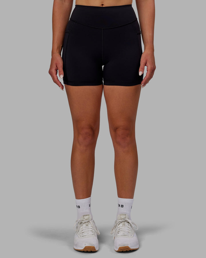 Woman wearing Elite X-Length Shorts - Black
