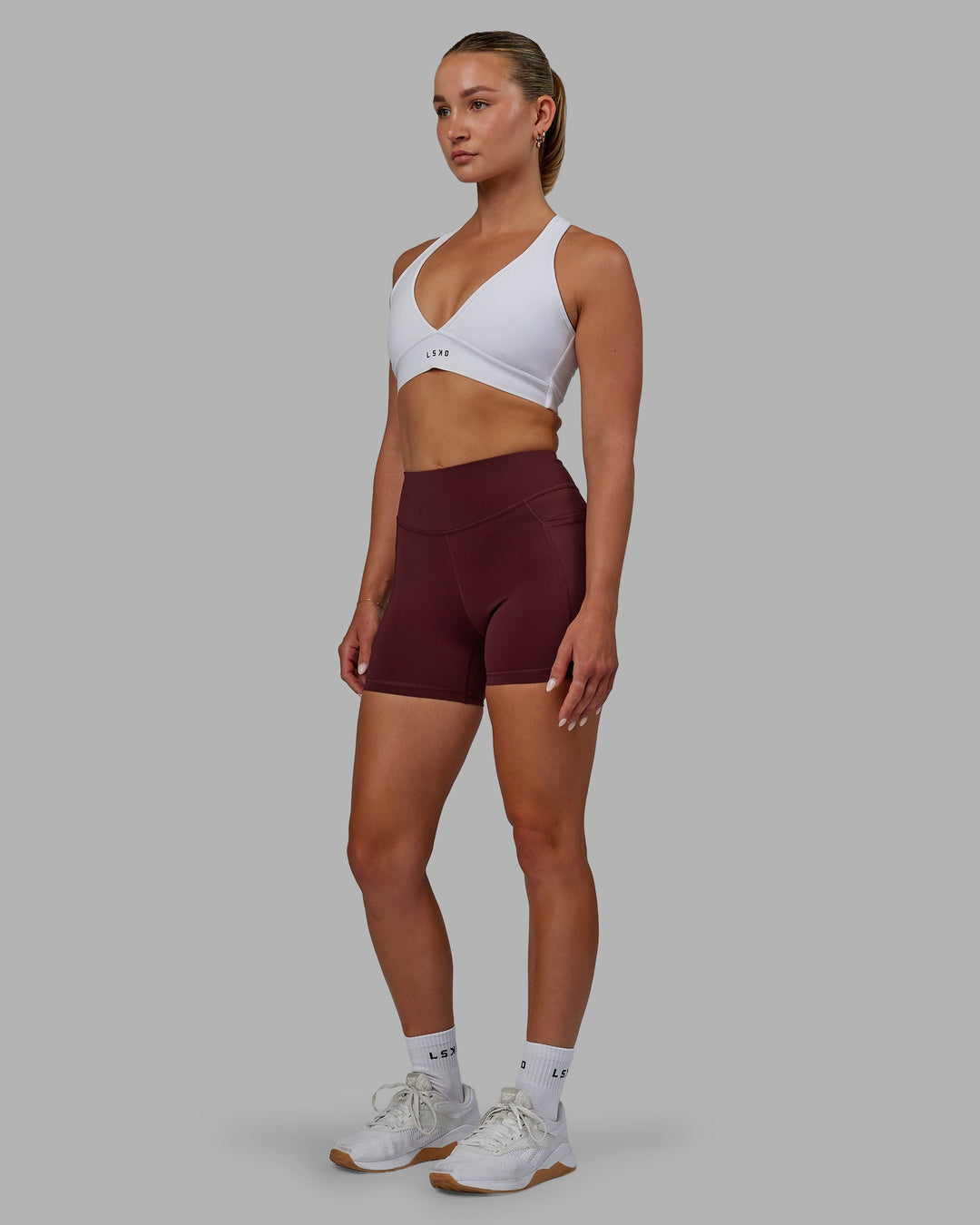 Woman wearing Elite X-Length Shorts - Dark Cherry