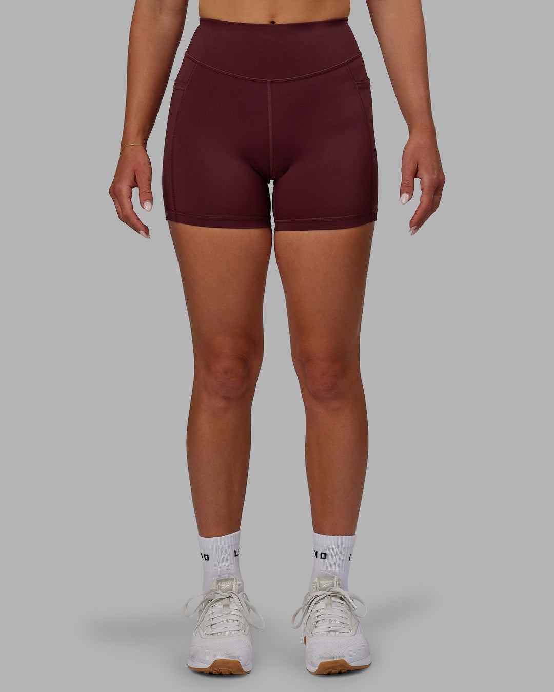 Woman wearing Elite X-Length Shorts - Dark Cherry