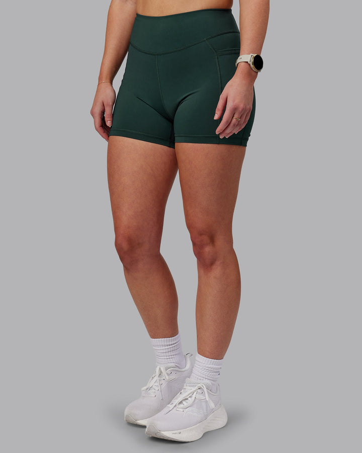 Woman wearing Elite X-Shorts - Vital Green
