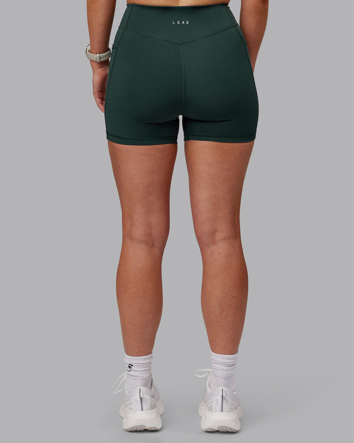 Woman wearing Elite X-Shorts - Vital Green
