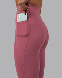 Woman wearing Elixir Ultra High-Rise 7/8 Legging Pockets - Mauve Haze