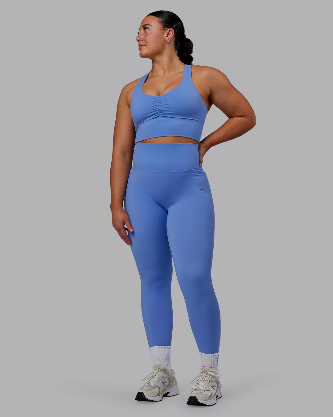 Woman wearing Elixir 7/8 Length Leggings With Pockets - Ultramarine