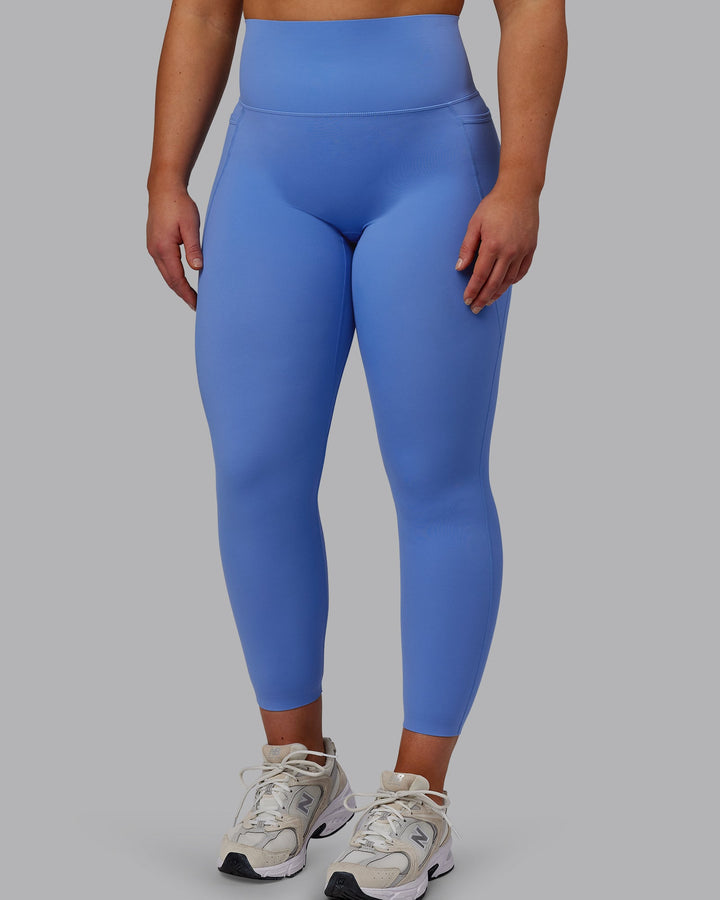 Woman wearing Elixir 7/8 Length Leggings With Pockets - Ultramarine
