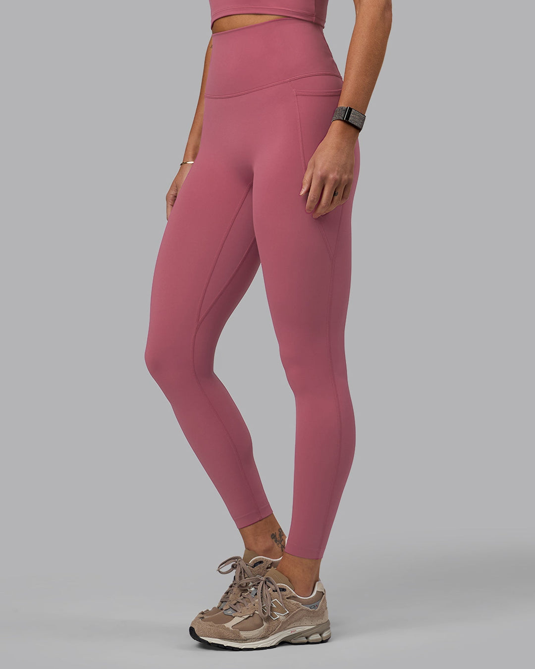 Woman wearing Elixir Full Length Leggings With Pockets - Mauve Haze