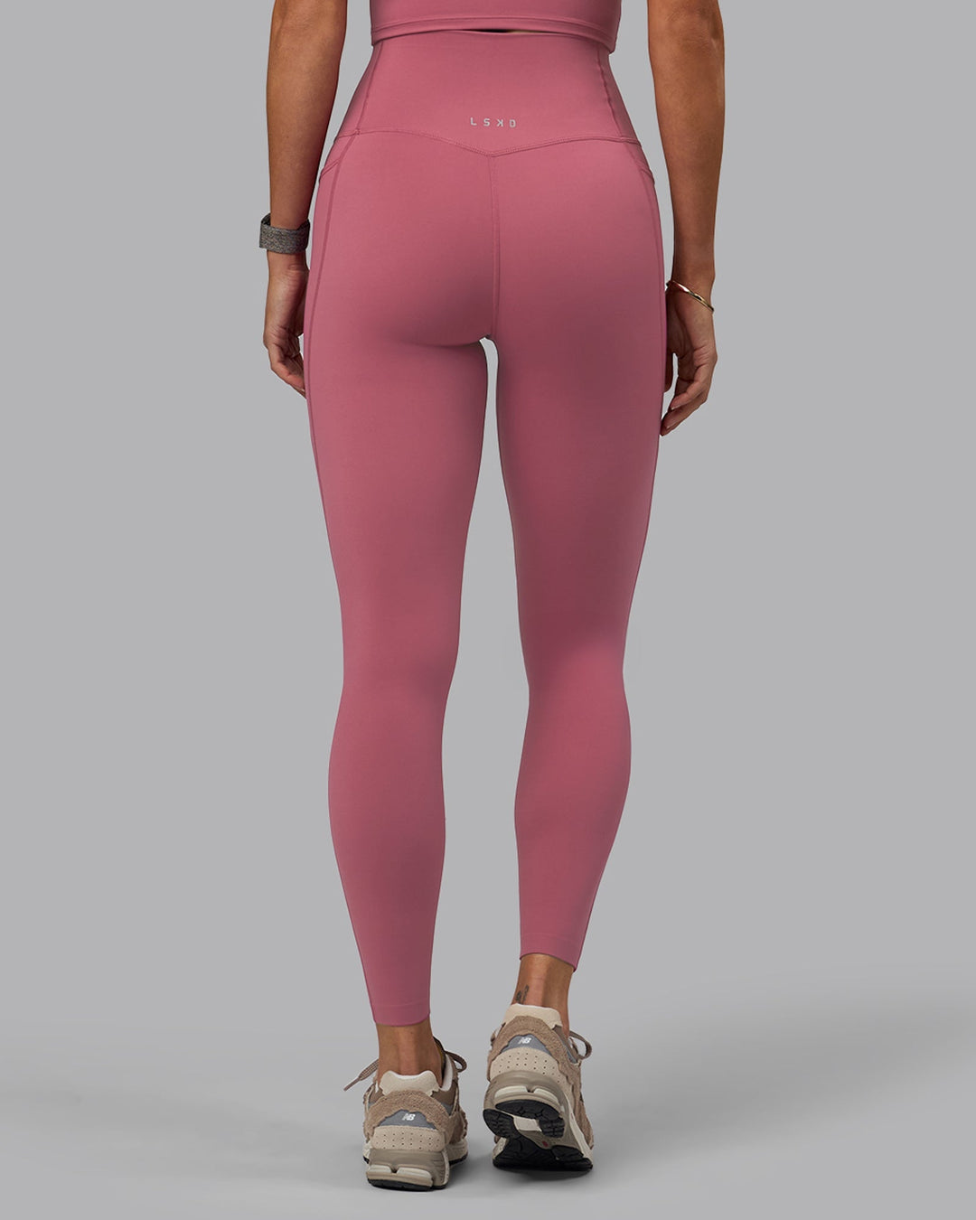 Woman wearing Elixir Full Length Leggings With Pockets - Mauve Haze