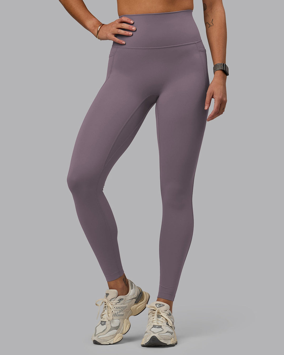 Woman wearing Elixir Ultra High-Rise Full Length Legging Pockets - Purple Sage