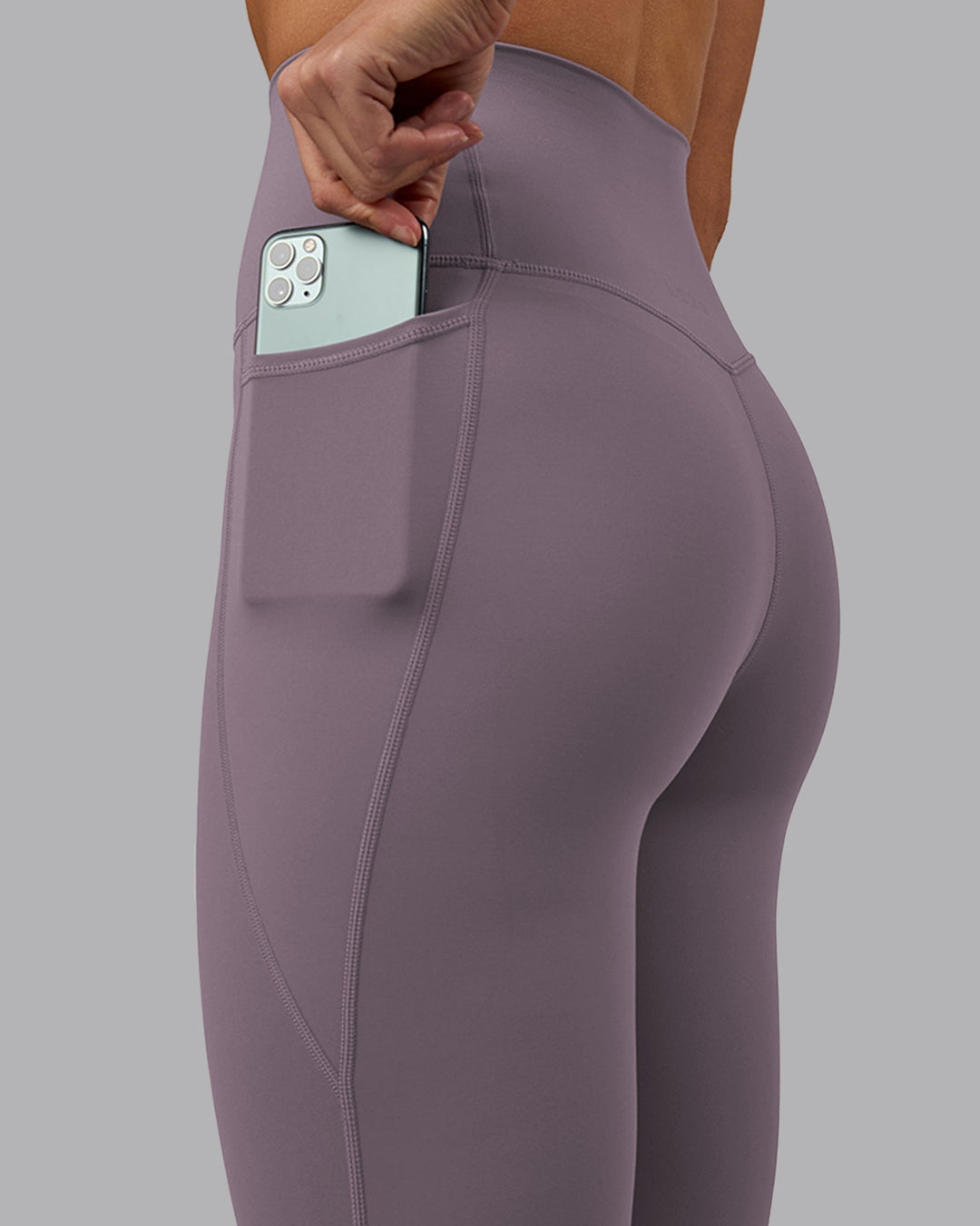 Woman wearing Elixir Ultra High-Rise Full Length Legging Pockets - Purple Sage
