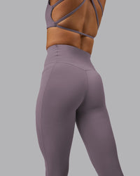 Woman wearing Elixir Ultra High-Rise Full Length Legging Pockets - Purple Sage