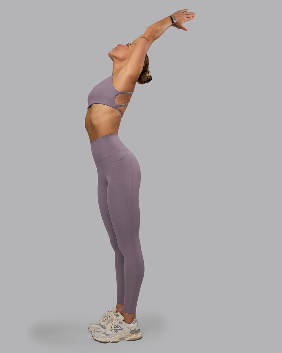 Woman wearing Elixir Ultra High-Rise Full Length Legging Pockets - Purple Sage