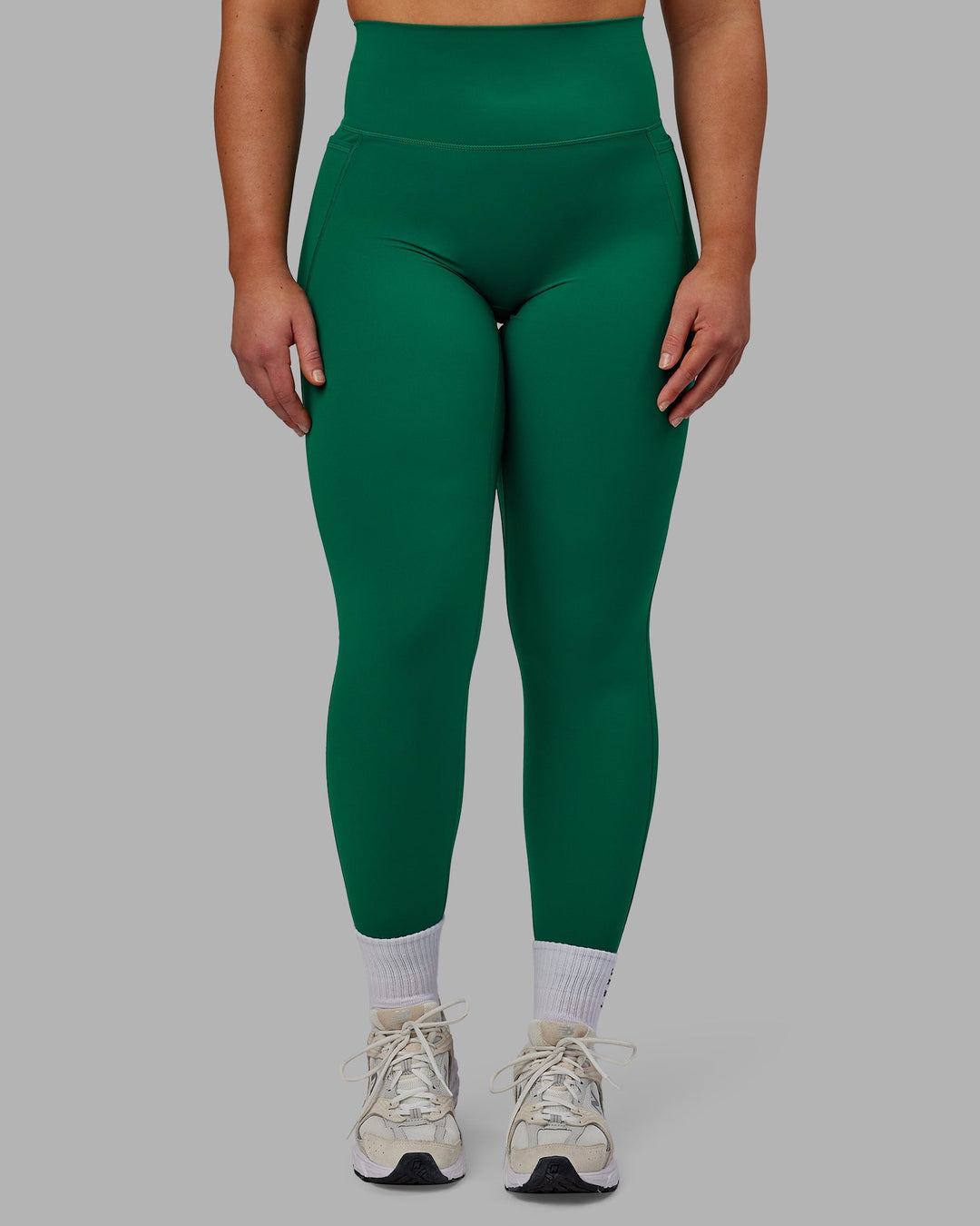 Woman wearing Elixir Full Length Leggings With Pockets - Malachite