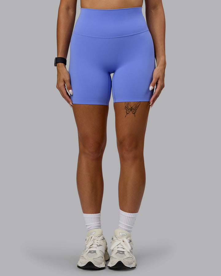 Woman wearing Elixir Mid Short Tights - Indulgent Blue
