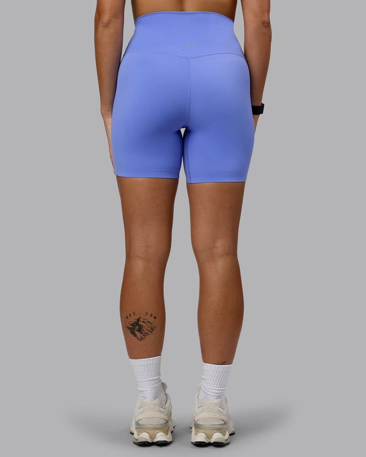 Woman wearing Elixir Mid Short Tights - Indulgent Blue
