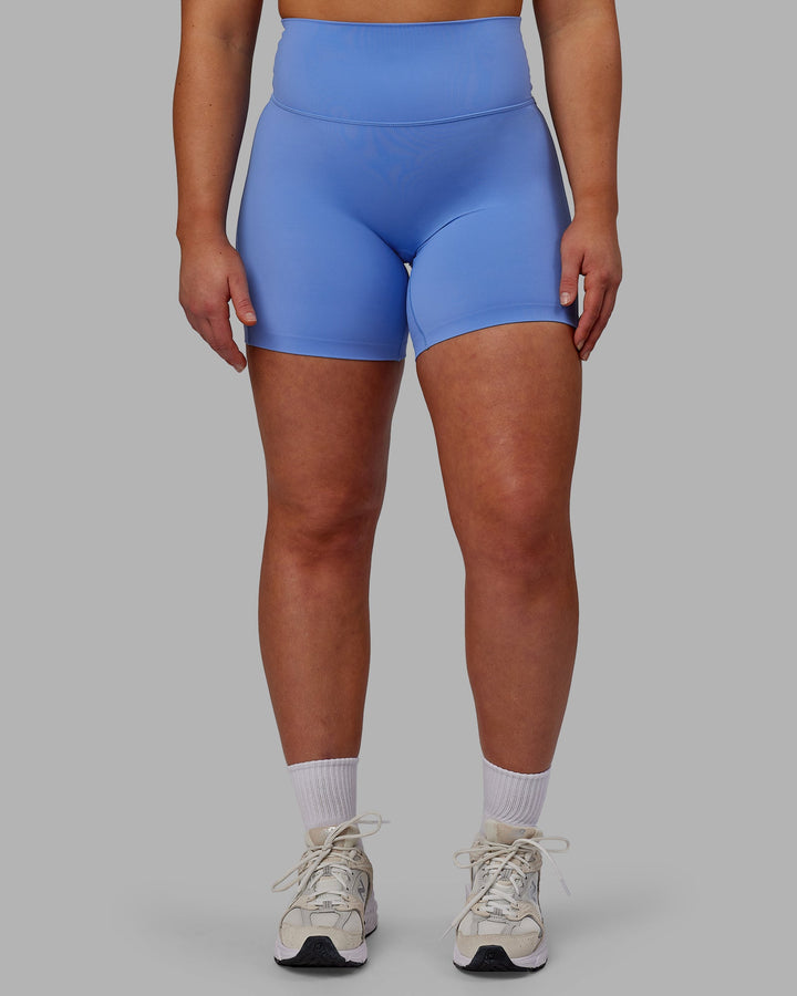 Woman wearing Elixir Mid-Length Shorts - Ultramarine
