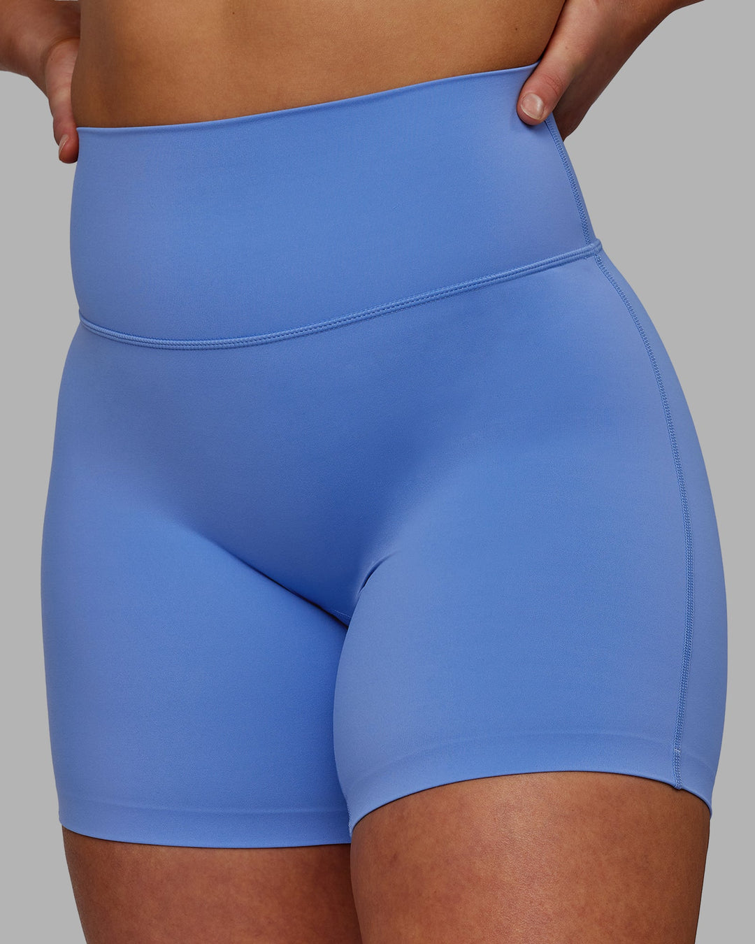 Woman wearing Elixir Mid-Length Shorts - Ultramarine