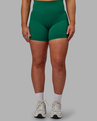 Woman wearing Elixir Mid-Length Shorts With Pockets - Malachite