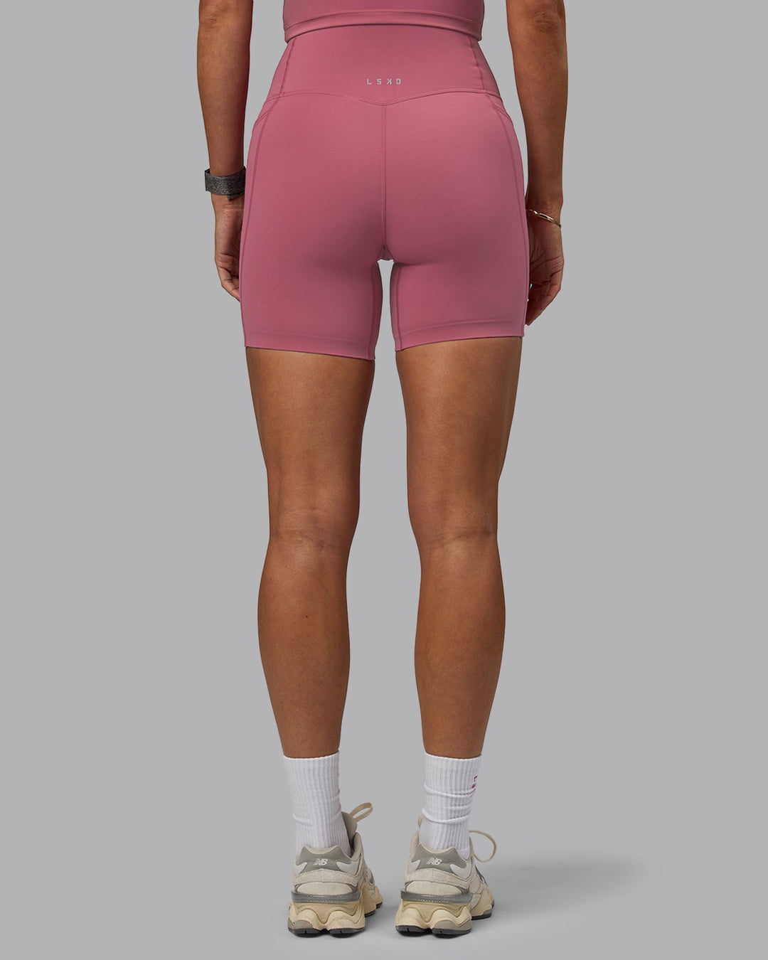 Woman wearing Elixir Mid-Length Shorts With Pockets - Mauve Haze