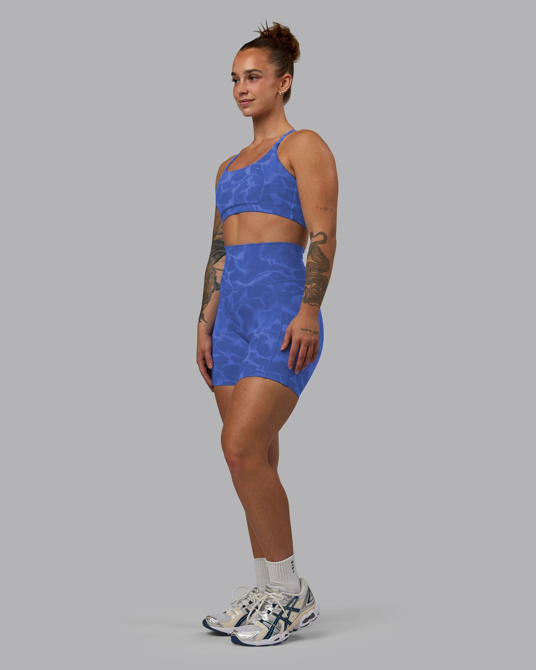 Woman wearing Elixir Mid-Length Shorts With Pockets - Tranquil-Power Cobalt