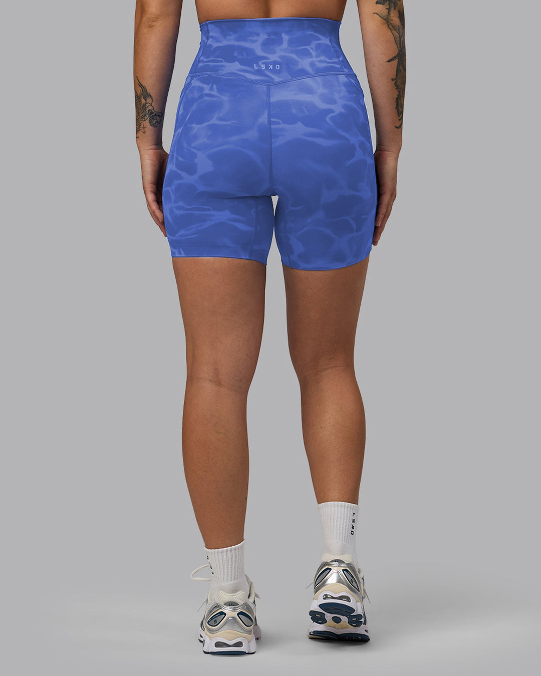 Woman wearing Elixir Mid-Length Shorts With Pockets - Tranquil-Power Cobalt