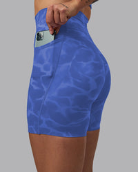 Woman wearing Elixir Ultra High-Rise 6" Short Pockets - Tranquil-Power Cobalt