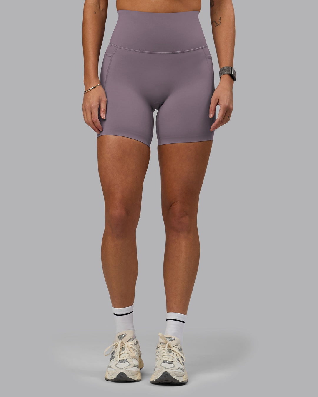 Woman wearing Elixir Mid-Length Shorts With Pockets - Purple Sage