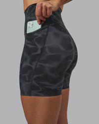 Woman wearing Elixir Ultra High-Rise 6" Short Pockets - Tranquil-Black
