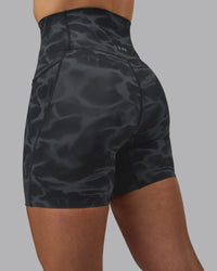Woman wearing Elixir Ultra High-Rise 6" Short Pockets - Tranquil-Black