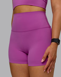 Woman wearing Elixir Ultra High-Rise 4" Short - Orchid