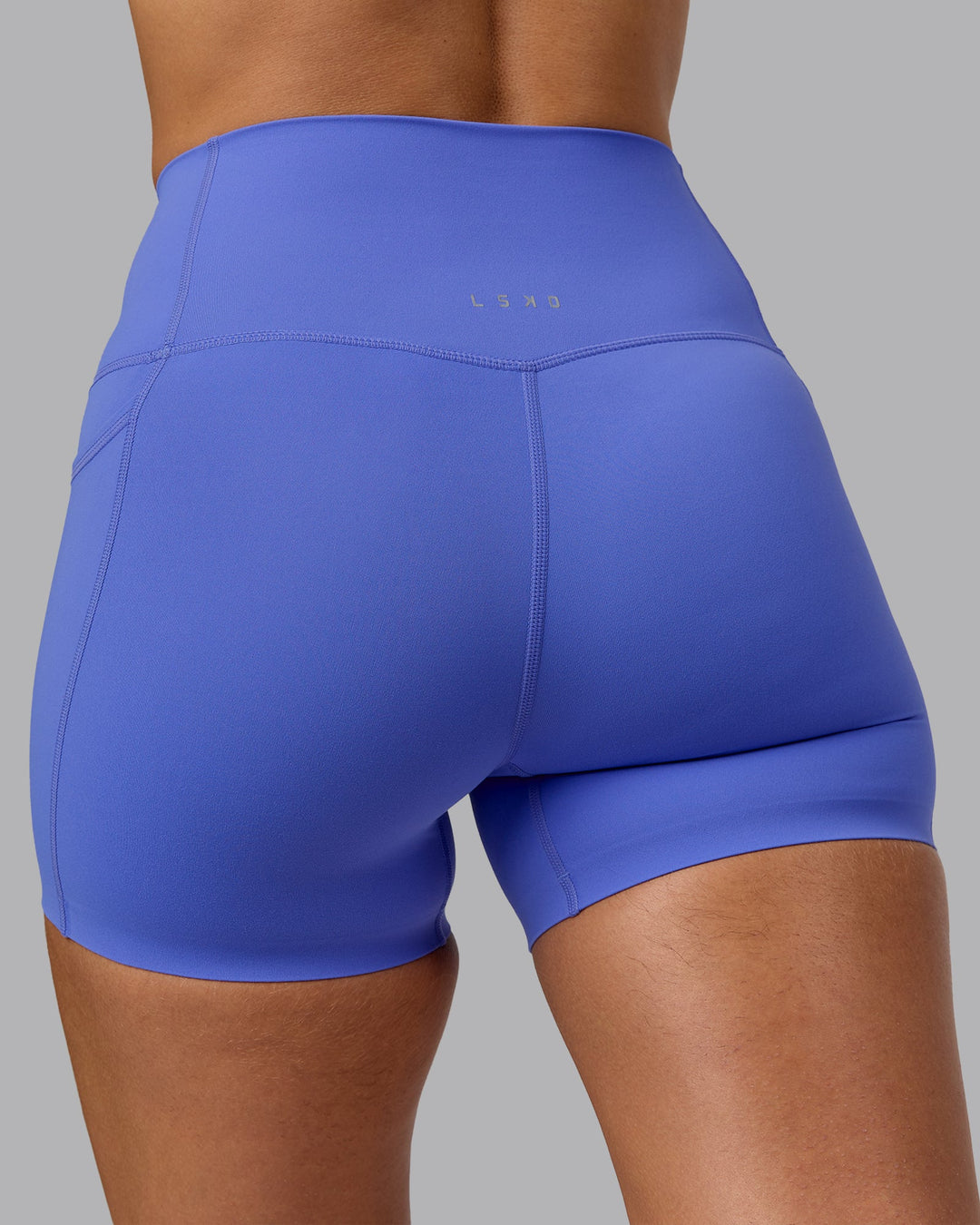 Woman wearing Elixir X-Short Tights With Pockets - Baja Blue