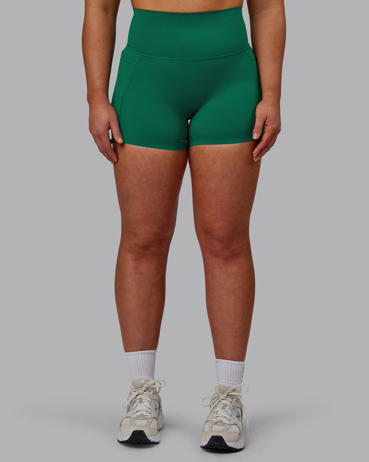 Woman wearing Elixir X-Short Tights With Pockets - Malachite
