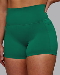 Woman wearing Elixir Ultra High-Rise 4" Short Pockets - Malachite