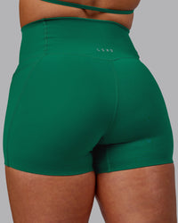 Woman wearing Elixir Ultra High-Rise 4" Short Pockets - Malachite