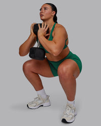 Woman wearing Elixir Ultra High-Rise 4" Short Pockets - Malachite