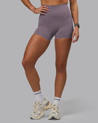 Woman wearing Elixir Ultra High-Rise 4" Short Pockets - Purple Sage