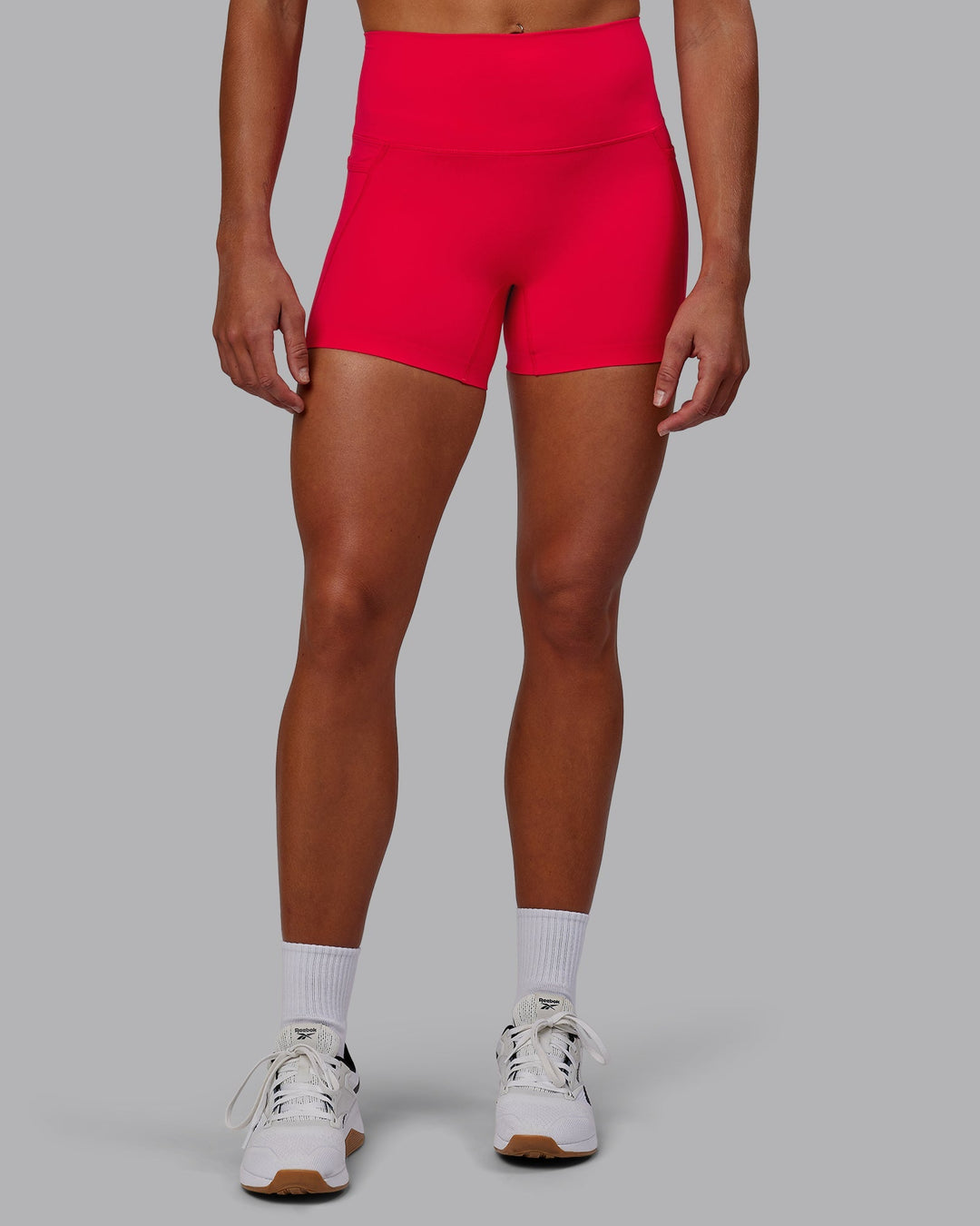 Woman wearing Elixir X-Length Shorts With Pockets - Scarlet