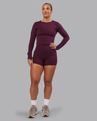 Woman wearing Elixir Ultra High-Rise 4" Short Pockets - Cherry Lacquer