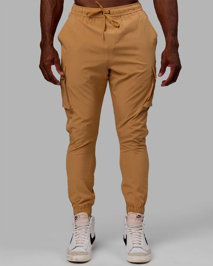 Man wearing Energy Stretch Performance Cargo Joggers - Latte
