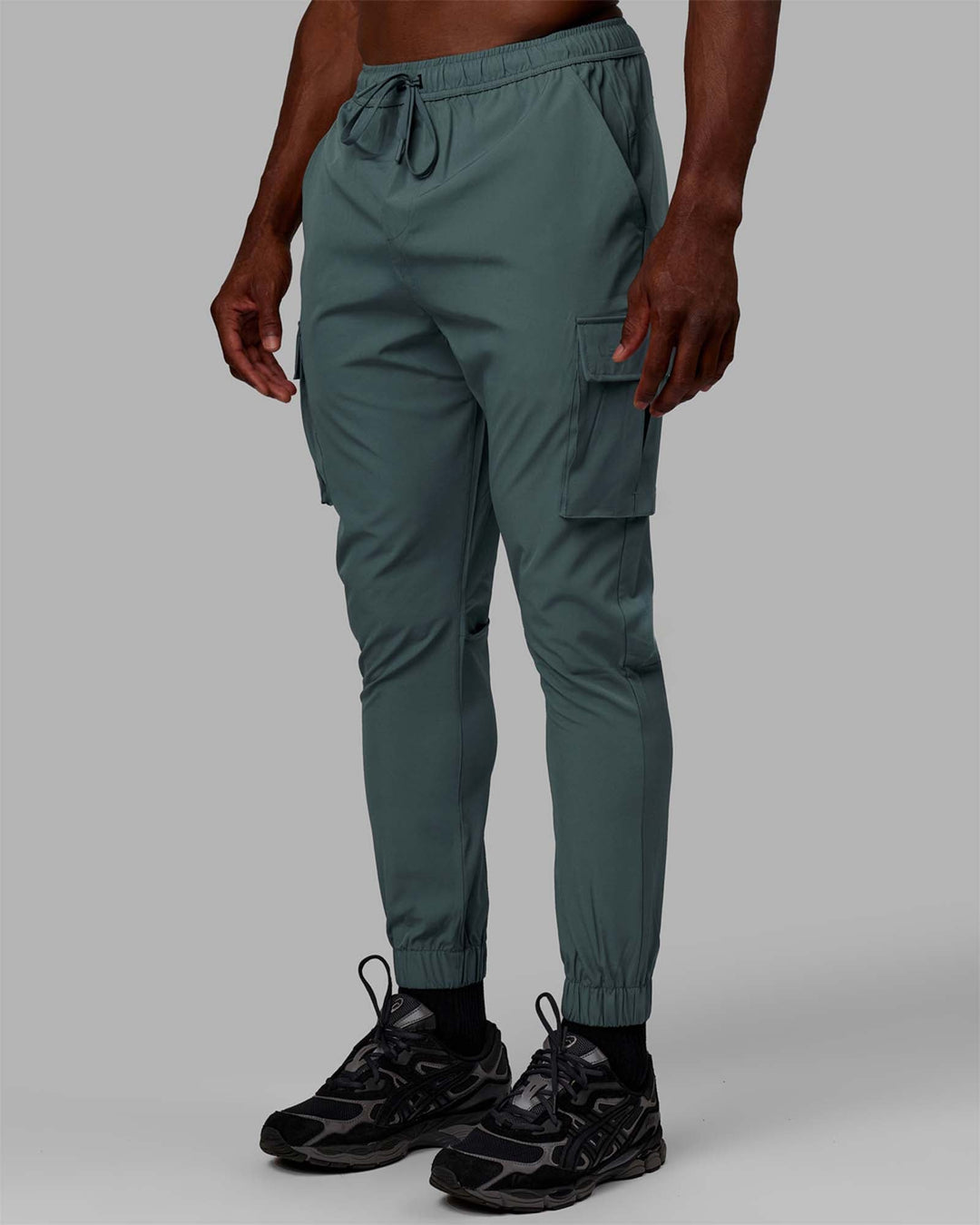 Man wearing Energy Stretch Performance Cargo Joggers - Storm